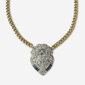 Vintage art deco clear and sapphire rhinestone pendant on brass curb chain