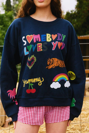 Somebody Loves You Graphic Sweatshirt