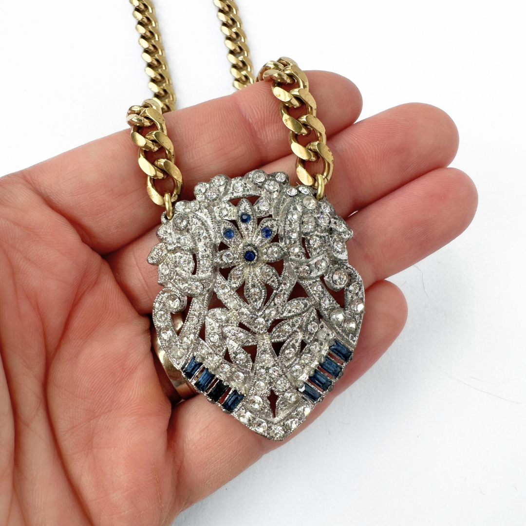 Vintage art deco clear and sapphire rhinestone pendant on brass curb chain