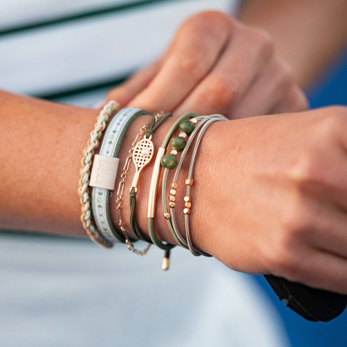 K'lani "Ace" Green and Gold Tennis Racket Charm Hair Tie Bracelets