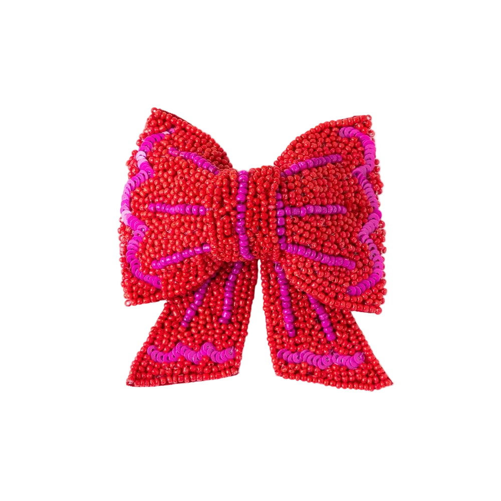 Red and pink beaded bow on a white background